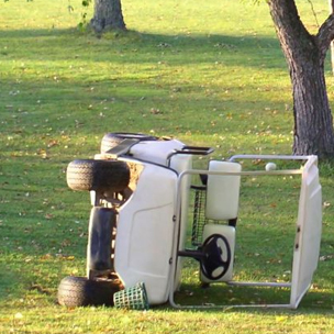 gold cart on its side